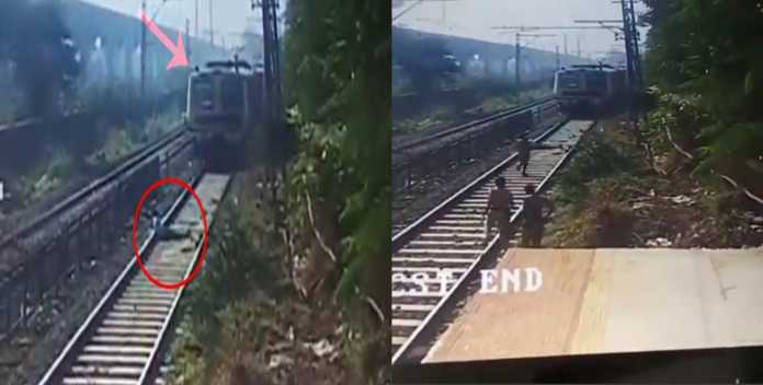 The man lay down with his neck on the track in front of the moving train, after that the train driver did wonders The man lay down with his neck on the track in front of the moving train, after that the train driver did wonders
